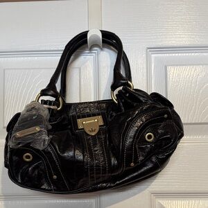 Juicy Couture Elegant Black Leather Handbag, new